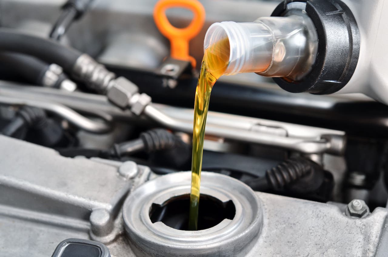 Dispensado de aceite para automóvil premium-asteclub